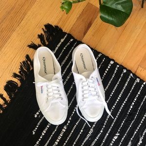 White slip on shoes.
